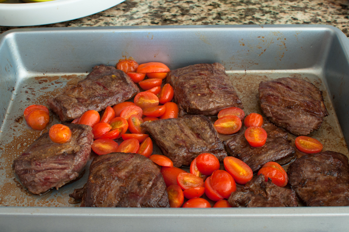 Roasting steak and tomatoes