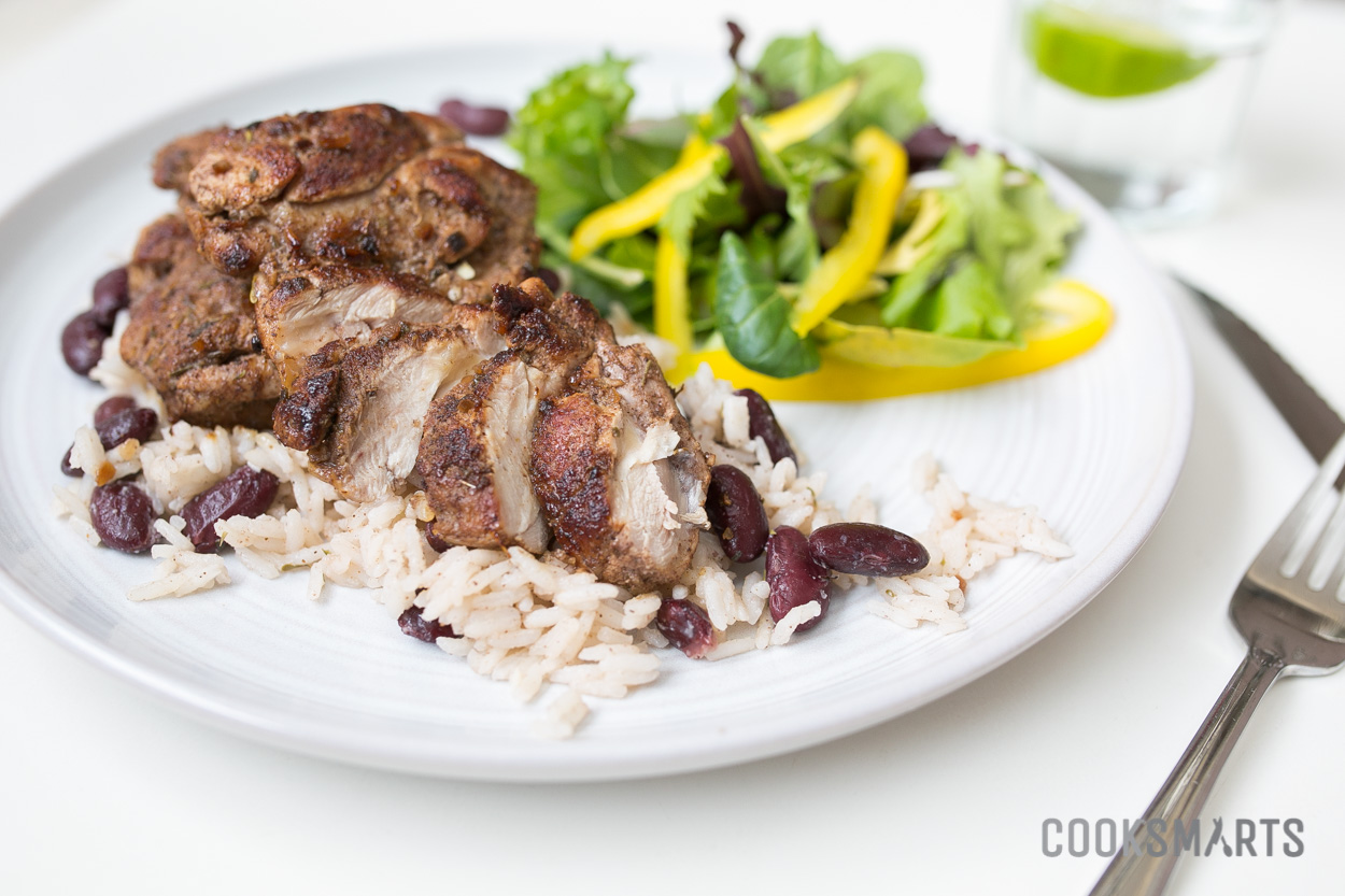 Jerk Chicken Thighs with Coconut Rice and Beans | #mealplan via @CookSmarts